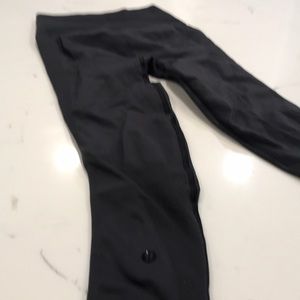 Black Lululemon 3/4 length yoga pants size 2